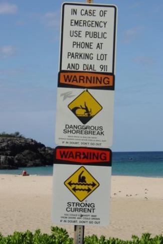 safety / warning signs on a beach